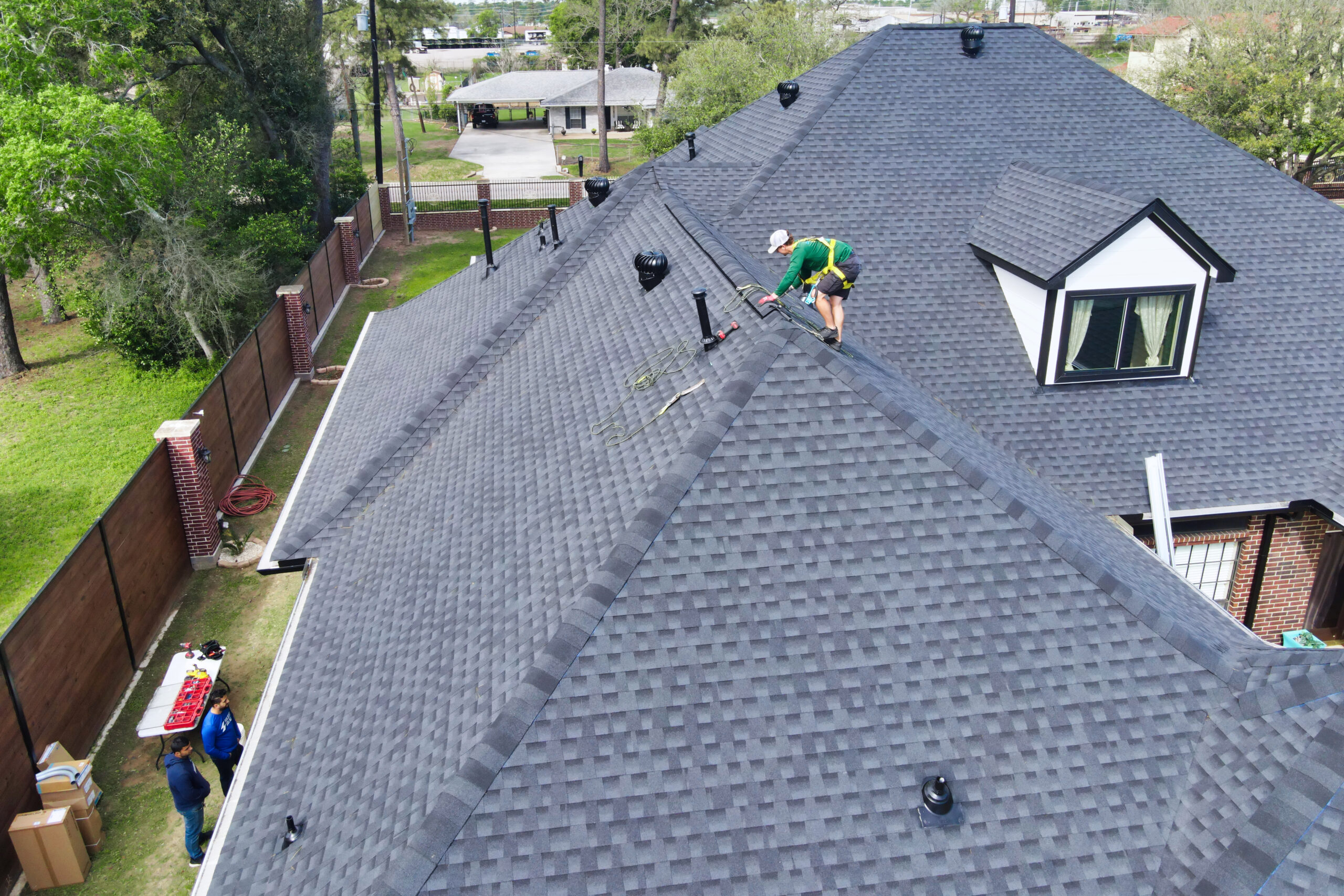 Solstice Solar installer on a residential rooftop in Houston Texas