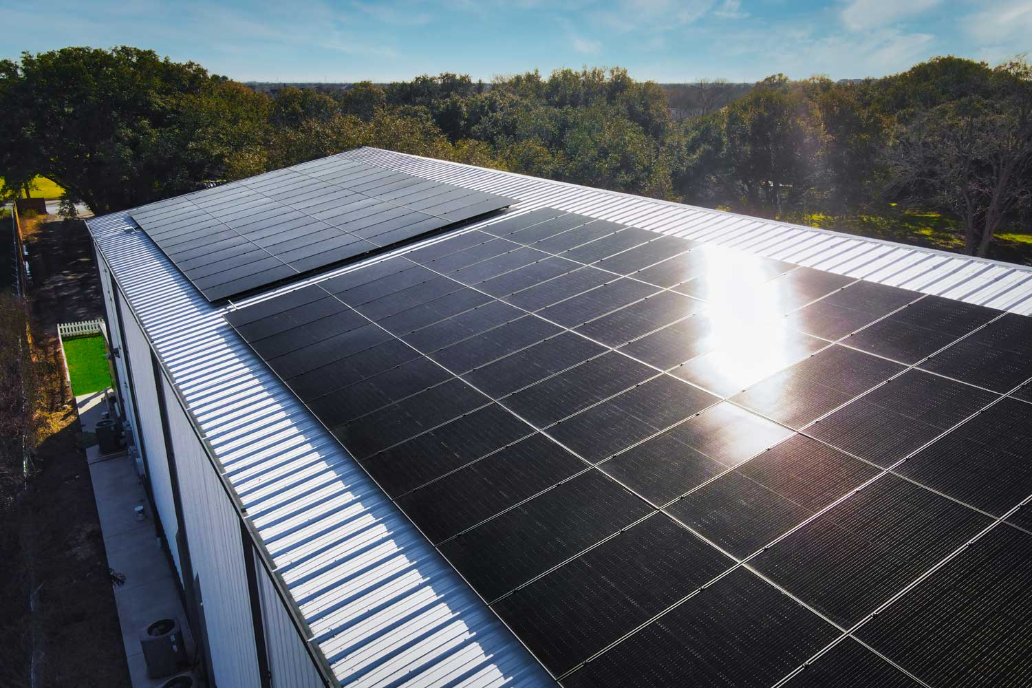 Commercial solar installation featuring a 25.9 kW system size accompanied by an Enphase battery backup of 40 kWh.