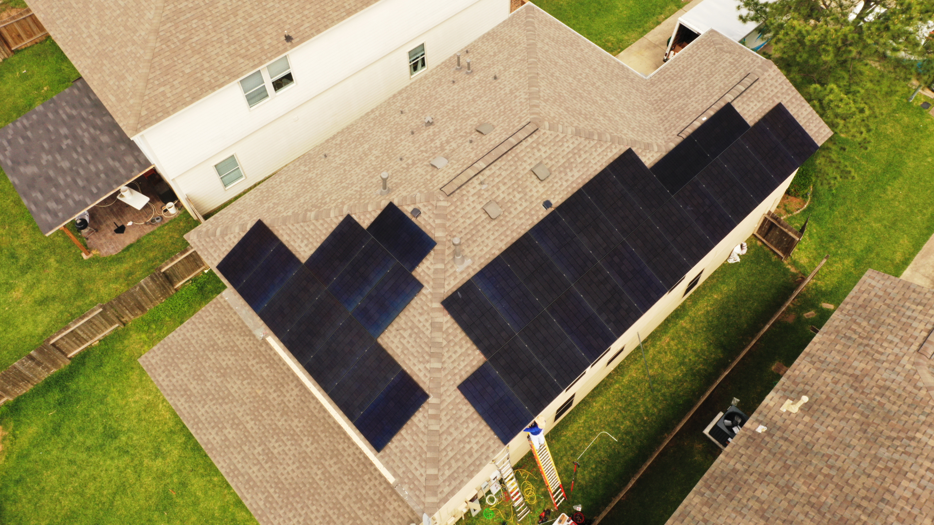 Residential roof in Houston with solar panels installed